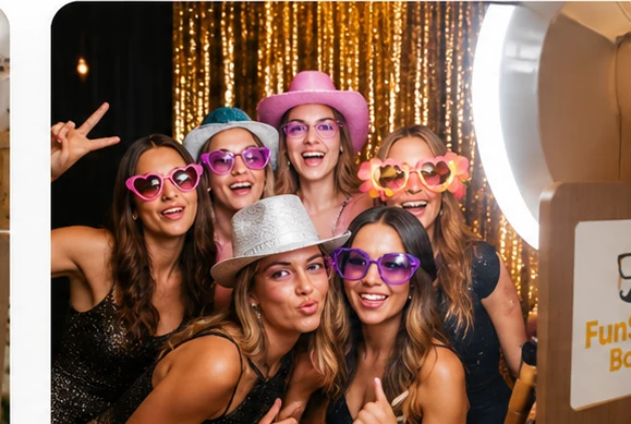 Guests celebrating at a birthday party with FunShots Booth