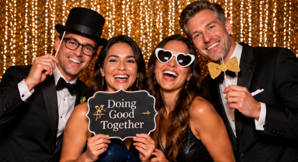 Guests enjoying a photo experience at a formal gala